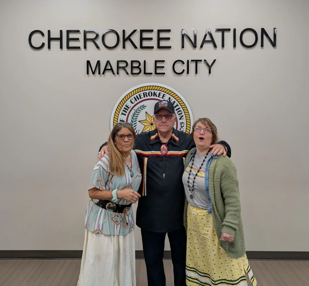 Smiling trio at Cherokee Nation entrance