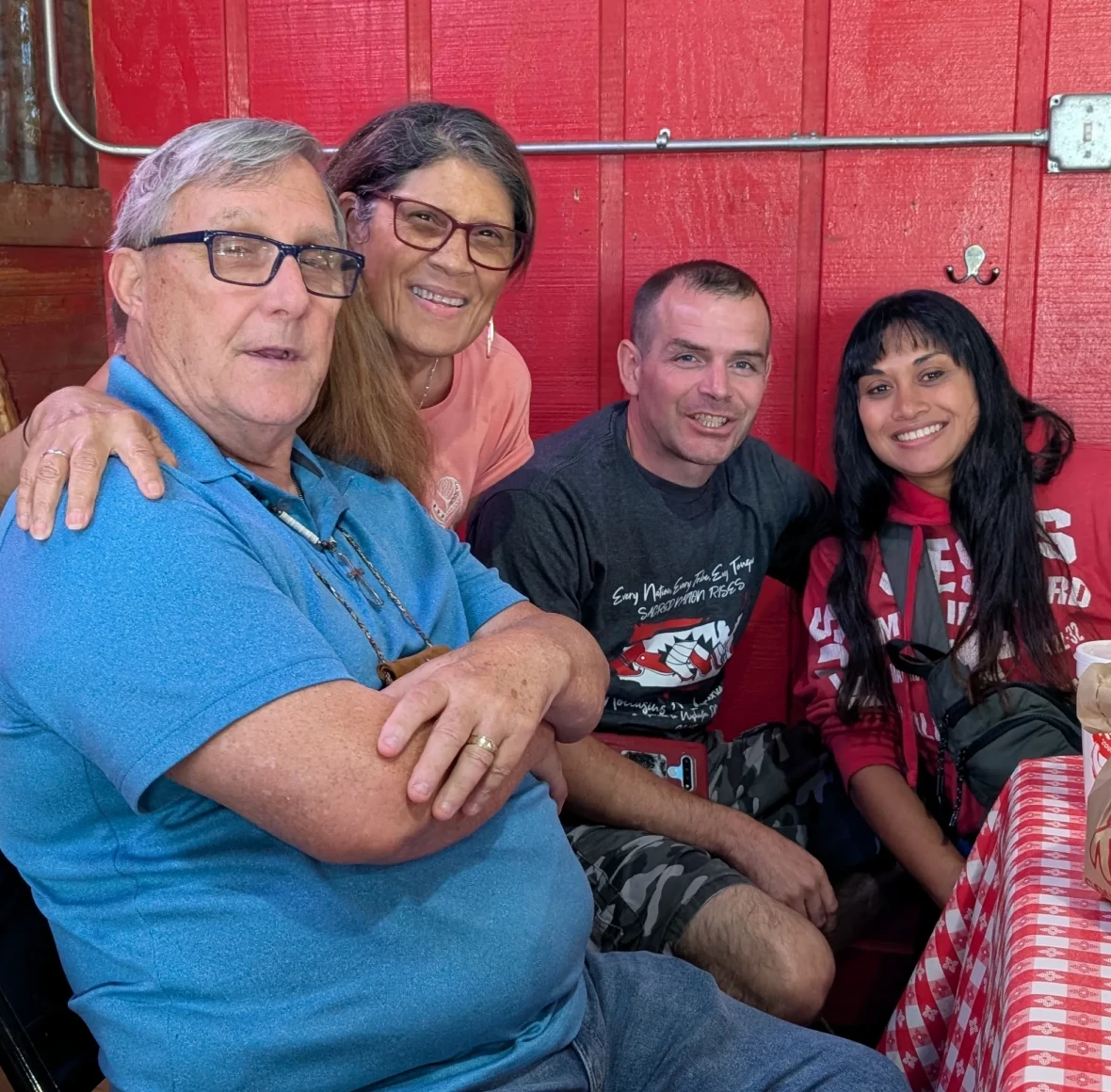 Happy people gathered at a table